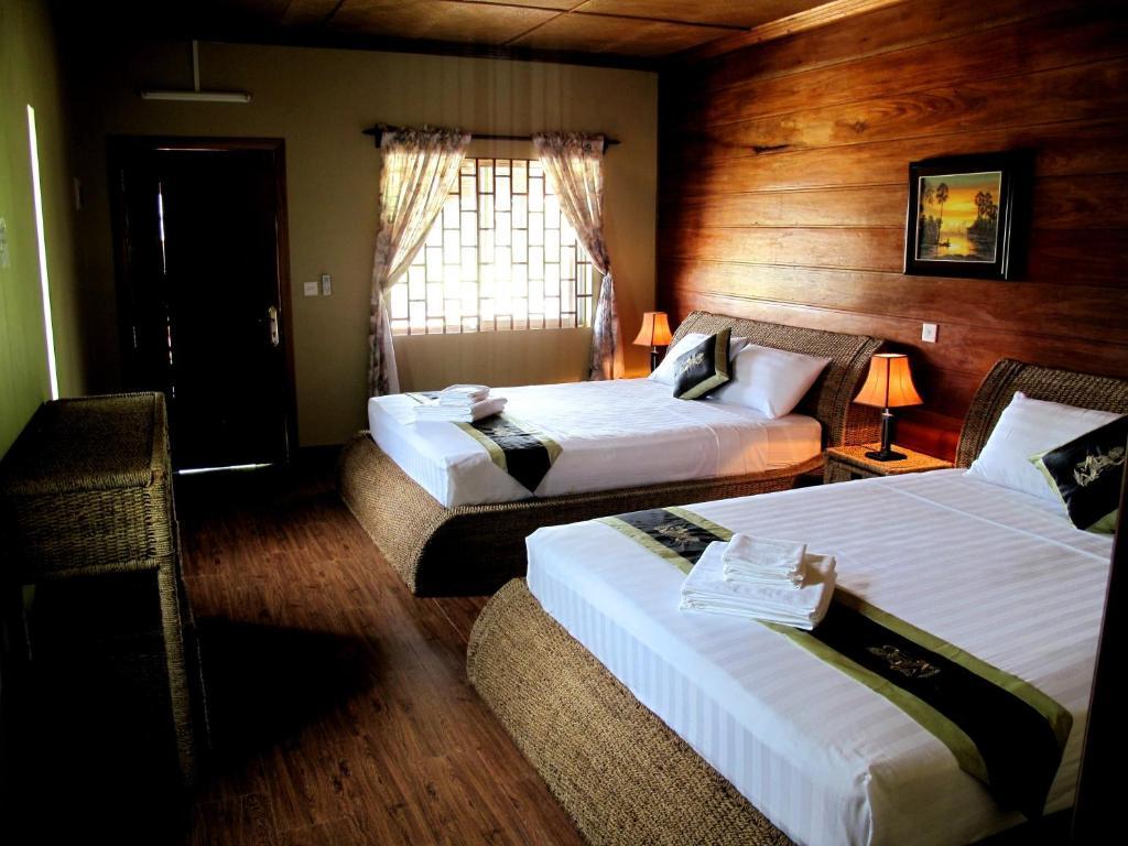 Atmaland Resort Kep Bilik gambar